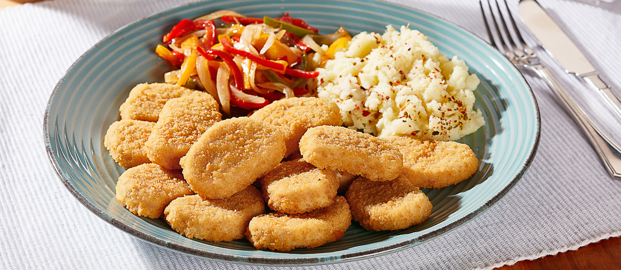 Receta de Nuggets de pollo con puré de camote | Super Pollo